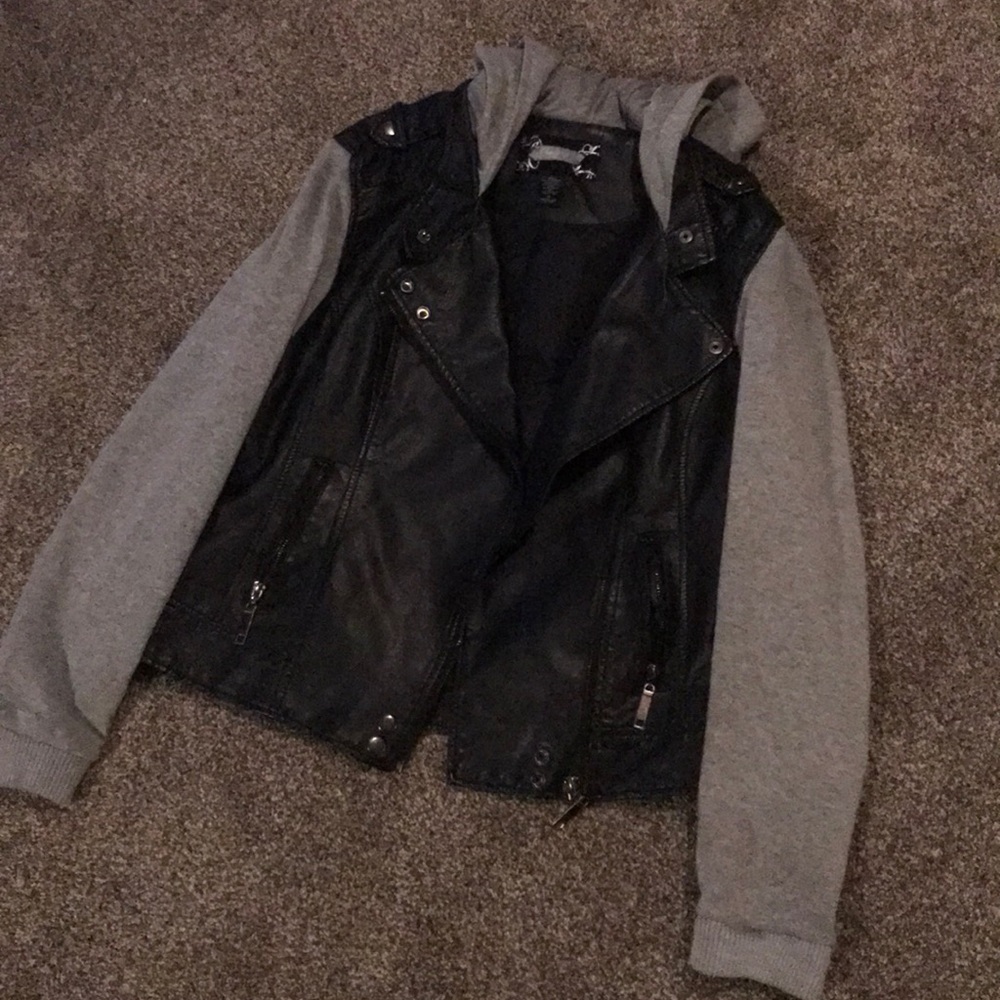 Faux leather jacket with fabric sleeves